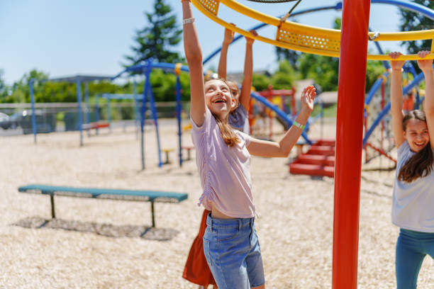 istock Tween girls having fun during school recess 1588210823