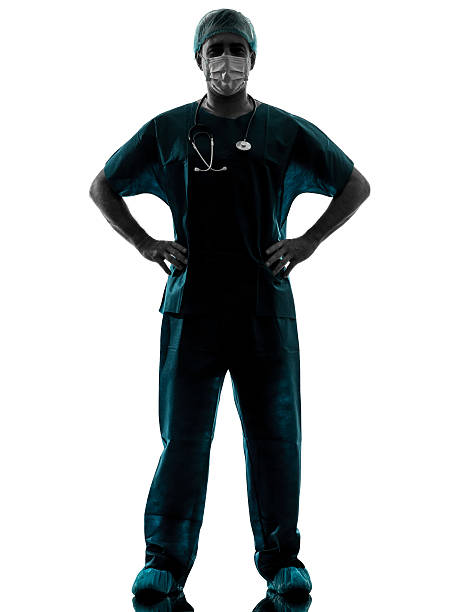 istock doctor surgeon man with face mask silhouette 158822826