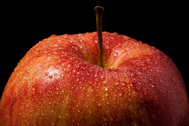 istock Red Apple Covered in Water Droplets 158822846