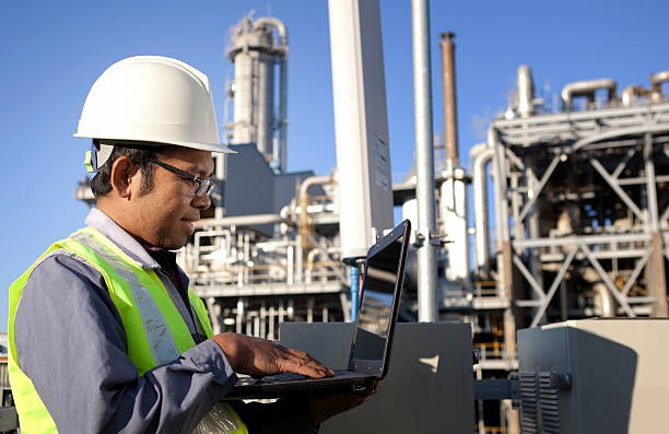 istock An engineer at a power plant working on a laptop 158823318