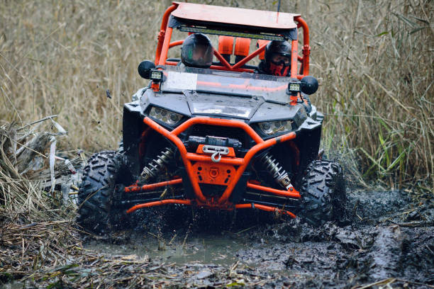 istock Cool view on extreme ride on ATV, buggy, quad, UTV, 4x4 1588243077