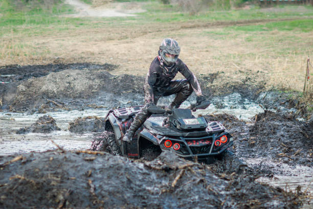 istock ATV, UTV, buggy, 4x4 off-road vehicle in muddy water. Extreme, adrenalin 1588248012