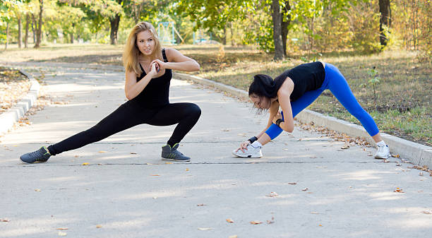 istock Two women working out together 158825631