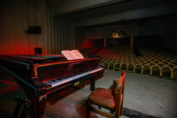 istock Old piano in abandoned concert hall 1588334369