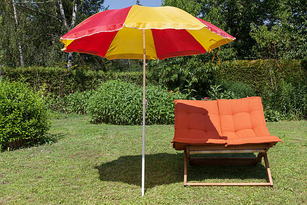istock Beach chair with umbrella 158834599