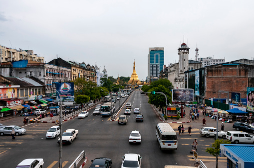 Yangon - Rangoon, Myanmar - nov 12, 2012: view of the modern downtown of Yangon, with the golden Sule Pagoda in the background