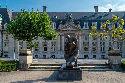 Luxembourg City, Luxembourg - August 27, 2013: Statue Mother and Child, representing a mother and her child, created in 1983 by the sculptor Henry Moore, located in Place des Martyrs in Luxembourg City