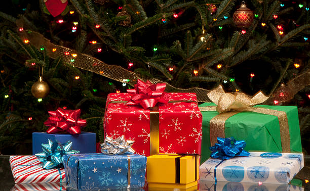 istock Grouping Christmas presents in front of tree 158839353
