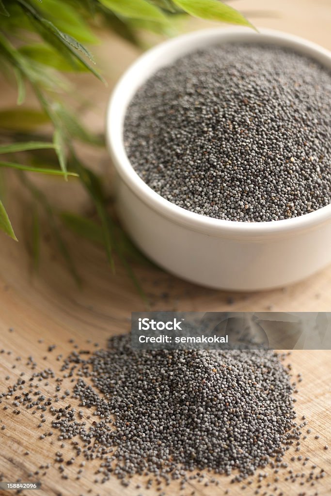 Black poppy seeds Black Color Stock Photo
