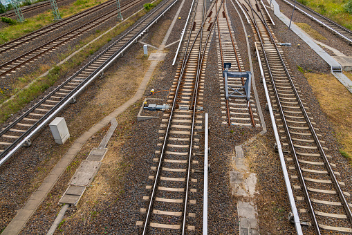 Railway station with freight wagons, rails and platforms