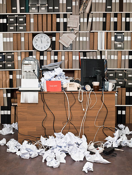 istock Messy office space with bookcase in the background 158849104