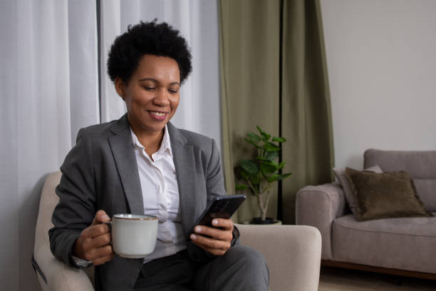 istock Woman using smart phone 1588573150