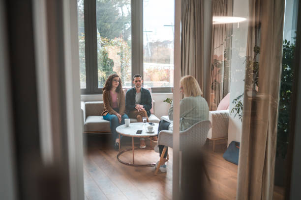 istock Female Couple Counselor with Clients 1588601486