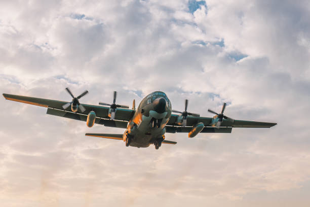 istock Propeller Airplane cargo airplane flying in the air during sunset 1588636029