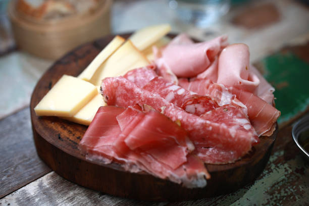 Antipasto is an Italian term that refers to a traditional appetizer course in Italian cuisine. It typically consists of a variety of cold dishes, such as cured meats, cheeses, olives, marinated vegetables, and other small bites