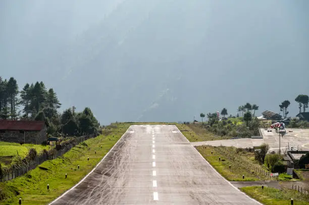 Photo of View of short airport runway of Tenzing–Hillary airport (known as Lukla Airport) in Lukla, Nepal.