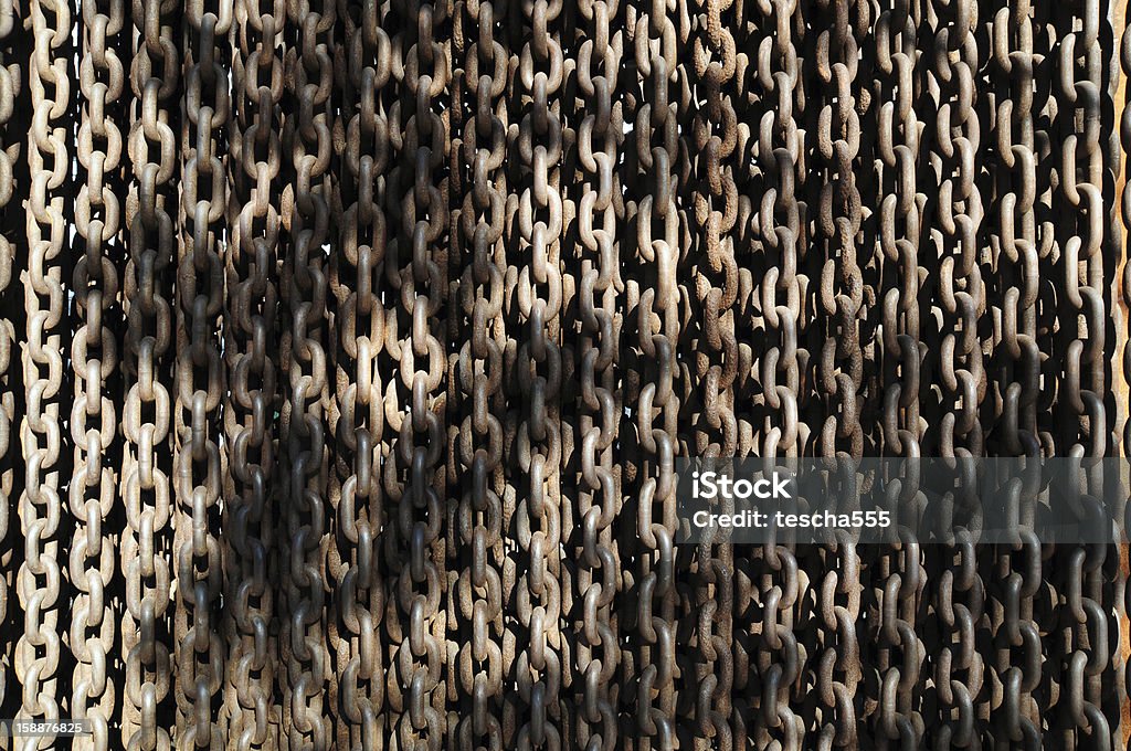 Rusty chains A lot of rusty chains hanging outdoors Chain - Object Stock Photo