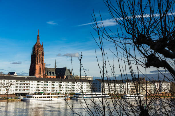 istock Main River and St. Bartholomew Cathedral in Frankfurt am Main, Germany 1588806543