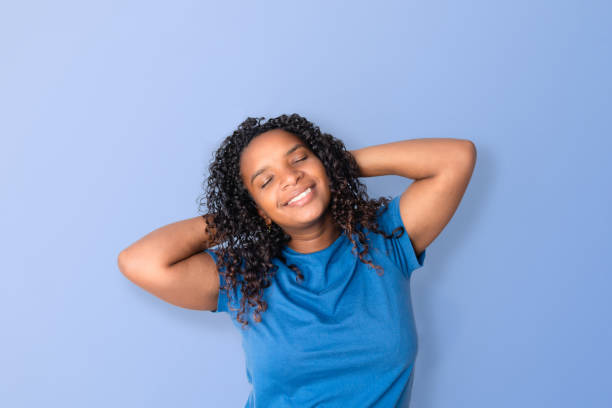 istock Beautiful woman smiling happily 1588812825