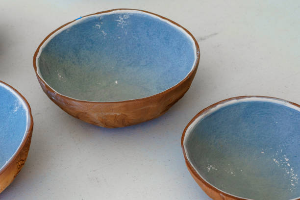 istock Handmade terra cotta clay bowls with blue glaze 1588818995
