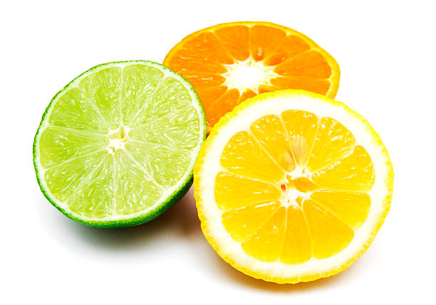 Citrus fruits cut arrangement oranges tangerines lime lemon and grapefruit with leaves isolated on white background leaving copy space