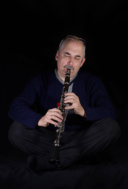 istock Mature man playing the clarinet jazz 158883885