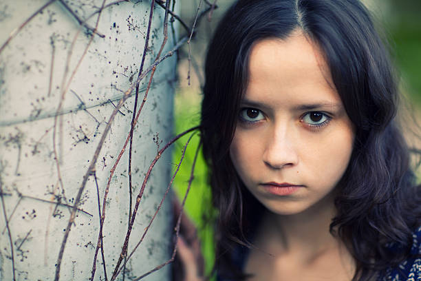 istock Young Woman In a Park 158888162