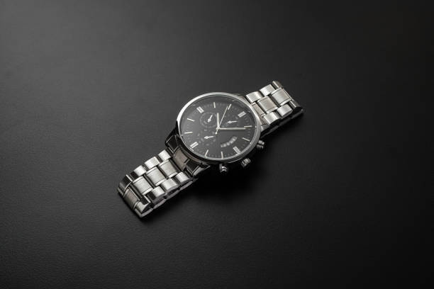 Luxury white chrome watch on black background