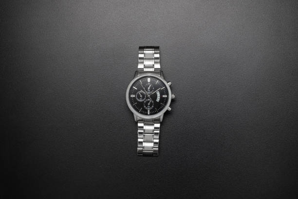 Luxury white chrome watch on black background