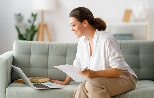 istock woman working on laptop at home 1588942318