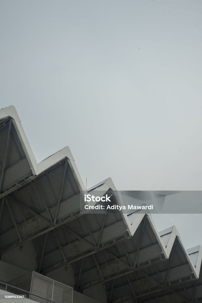 Roof building zigzag line repetition on hazy cloud architecture construction closeup detail Abstract Stock Photo Roof building zigzag line repetition on hazy cloud architecture construction closeup detail Abstract Stock Photo