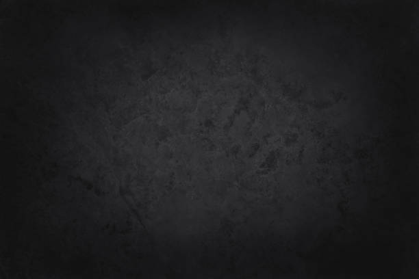 istock Dark grey black slate texture in natural pattern with high resolution for background and design art work. Black stone wall. 1588962175