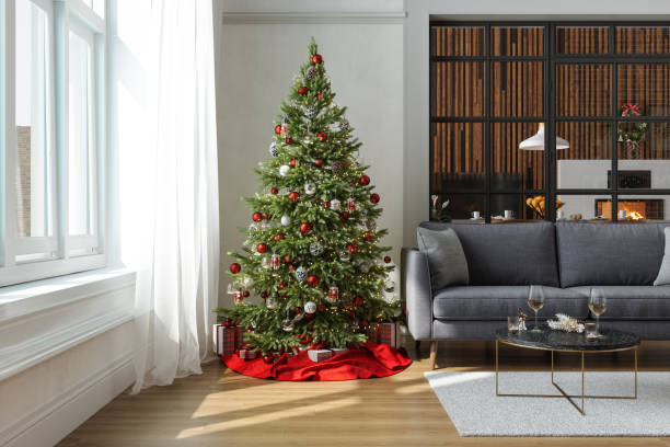 クリスマスツリー、ギフトボックス、ソファ、ダイニングルームの背景にモダンなリビングルームの内部
