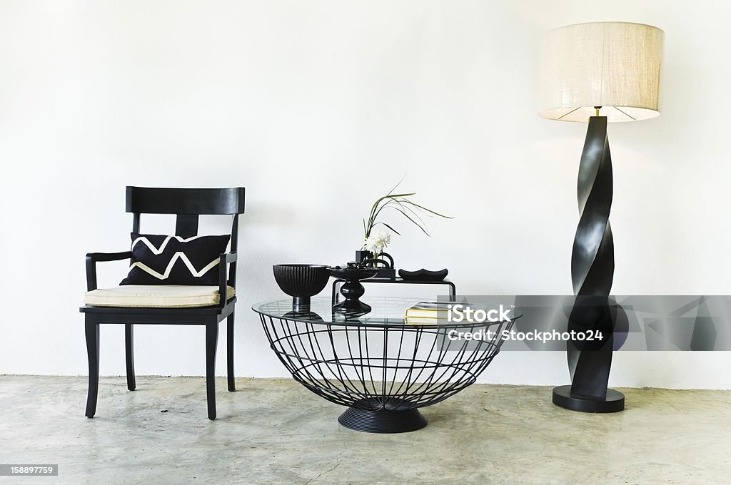 Contemporary seating combination in black with elegant pillows and details Beige Stock Photo