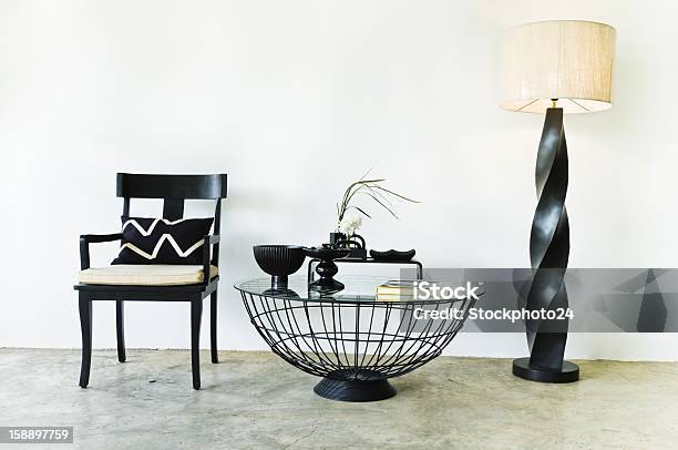 Contemporary Seating Combination In Black With Elegant Pillows And Details Stock Photo - Download Image Now
