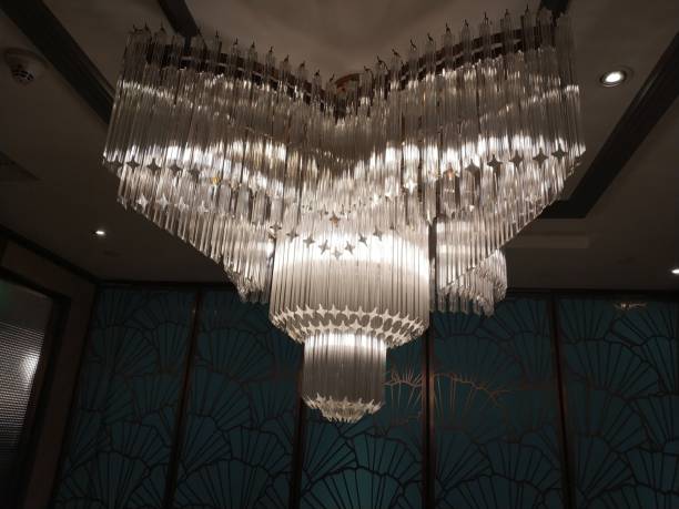 istock Chandeliers make a dramatic visual impact and are a great way to set the tone for a room's decor. Indeed for hundreds of years elegant history related to it. 1588996952