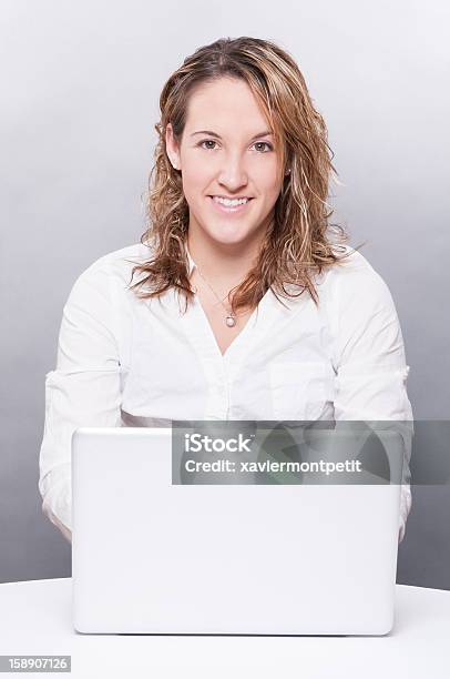 Youg Women Working On Laptop Stock Photo - Download Image Now - 20-29 Years, Adult, Adults Only