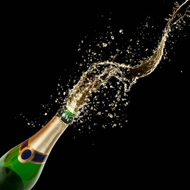 istock Open bottle of champagne with flowing champagne 158907320
