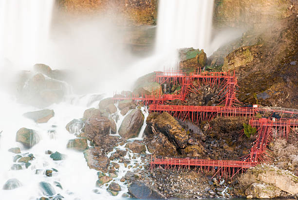 Waterfall and cascade around red decking stock photo