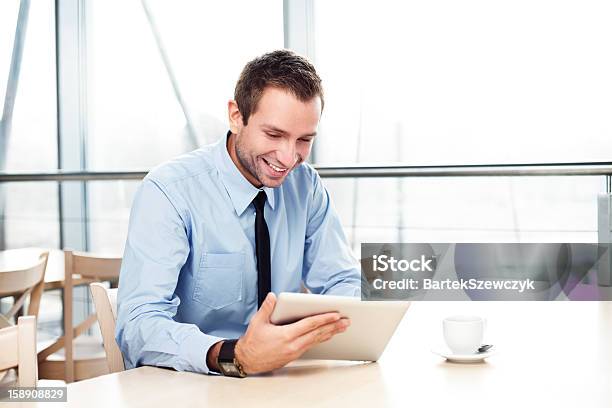 Businessman With Digital Tablet Smiling Stock Photo - Download Image Now - Digital Tablet, Office, Adult