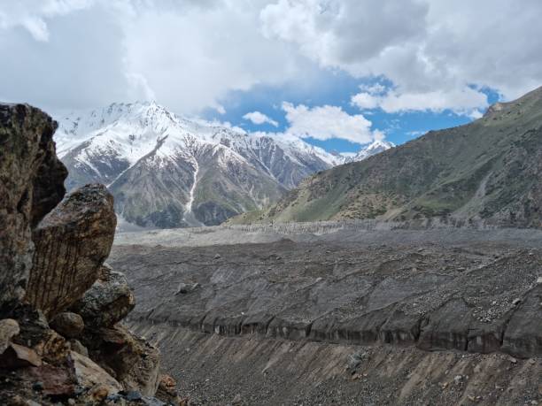 istock nanga parbat under clouds day view, Trishing Valley Rupal Valley, Nanga Parbat Base Camp, Rupal Face ,The beautifull valley of Astore 1589102987