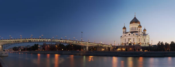 Panoramic view at orthodox Cathedral of Christ the Saviour and Moscow river illuminated at evening, Moscow, Russia