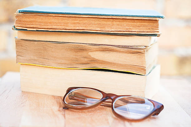istock glasses and books 158910677