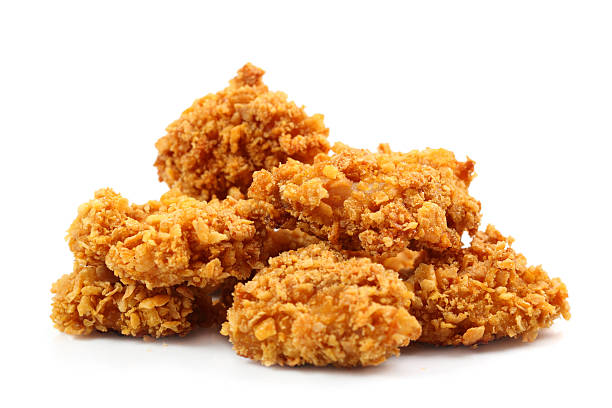 chicken nuggets - cornflakes stock-fotos und bilder