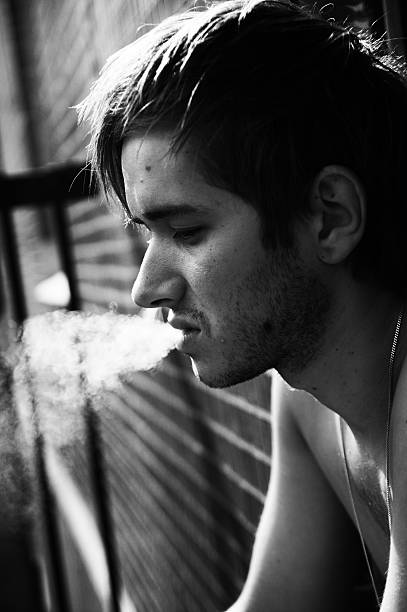 smoking man stock photo