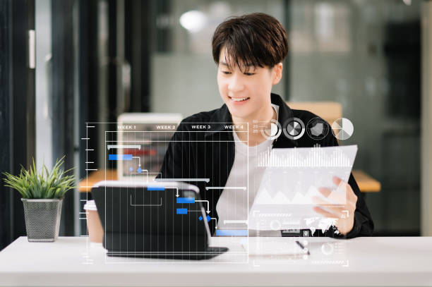 istock Project manager working and update tasks with milestones progress planning and Gantt chart scheduling diagram.business tram working at office 1589156461