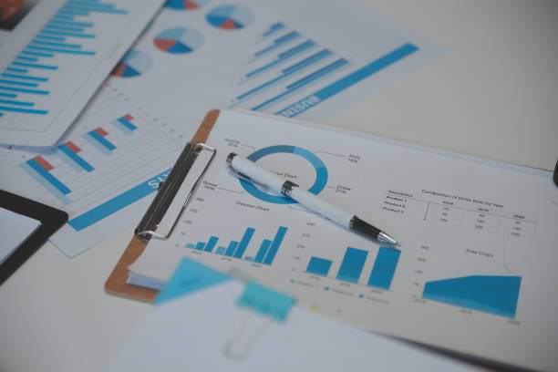 istock Business accounting concept, Business Man using calculator with computer laptop,pen, budget and loan paper in office. 1589164889