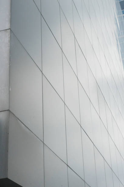 istock Modern architecture square block wall grey metallic texture detail 1589197425