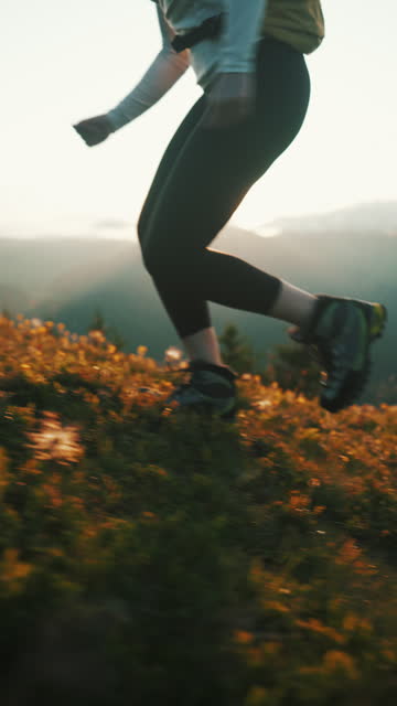Female running on the mountain.