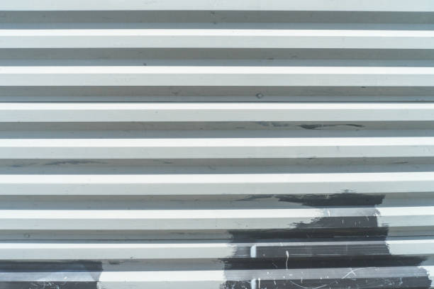 istock Metal white painted steel wall construction site temporary detail texture background 1589233571